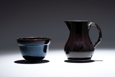 A black-glazed pottery coffeepot, teapot, milk jug and a bowl, Namur, 18th C.