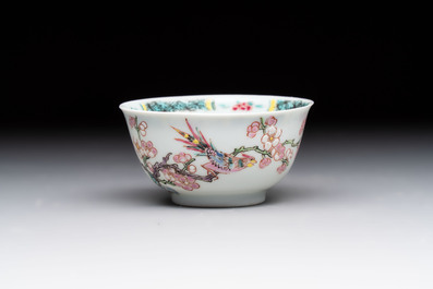 A set of six Chinese famille rose cups and saucers with birds among flowering branches, Yongzheng/Qianlong