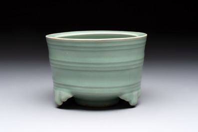 A Chinese Longquan celadon cylindrical tripod censer with &lsquo;trigrams&rsquo; design, Yuan/Ming