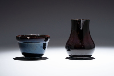 A black-glazed pottery coffeepot, teapot, milk jug and a bowl, Namur, 18th C.