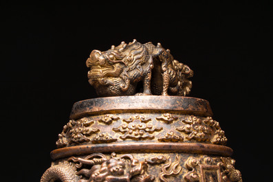 A fine Chinese gilt-bronze 'dragon among clouds' bell, Qianlong mark and of the period, dated 1743