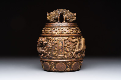 A fine Chinese gilt-bronze 'dragon among clouds' bell, Qianlong mark and of the period, dated 1743