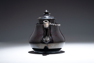 A black-glazed pottery coffeepot, teapot, milk jug and a bowl, Namur, 18th C.