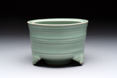 A Chinese Longquan celadon cylindrical tripod censer with &lsquo;trigrams&rsquo; design, Yuan/Ming