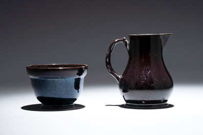 A black-glazed pottery coffeepot, teapot, milk jug and a bowl, Namur, 18th C.