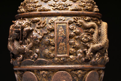 A fine Chinese gilt-bronze 'dragon among clouds' bell, Qianlong mark and of the period, dated 1743