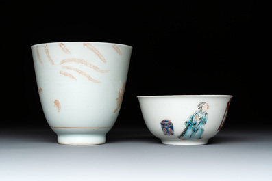 A Chinese iron-red-decorated 'boy and buffalo' cup and saucer and a famille rose 'Xi Xiang Ji' cup and saucer, Qianlong