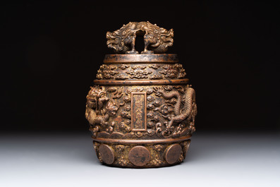 A fine Chinese gilt-bronze 'dragon among clouds' bell, Qianlong mark and of the period, dated 1743