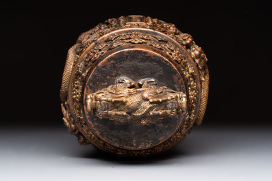 A fine Chinese gilt-bronze 'dragon among clouds' bell, Qianlong mark and of the period, dated 1743