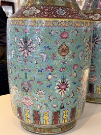 A pair of large Chinese famille rose turquoise-ground 'Buddhist symbols and lotus scroll' vases, Guangxu mark and of the period