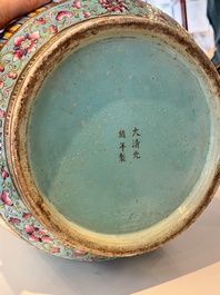 A pair of large Chinese famille rose turquoise-ground 'Buddhist symbols and lotus scroll' vases, Guangxu mark and of the period