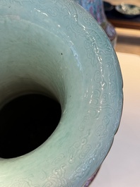 A pair of large Chinese famille rose turquoise-ground 'Buddhist symbols and lotus scroll' vases, Guangxu mark and of the period