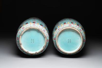 A pair of large Chinese famille rose turquoise-ground 'Buddhist symbols and lotus scroll' vases, Guangxu mark and of the period
