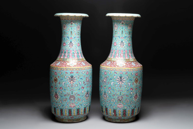 A pair of large Chinese famille rose turquoise-ground 'Buddhist symbols and lotus scroll' vases, Guangxu mark and of the period
