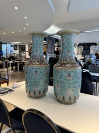 A pair of large Chinese famille rose turquoise-ground 'Buddhist symbols and lotus scroll' vases, Guangxu mark and of the period