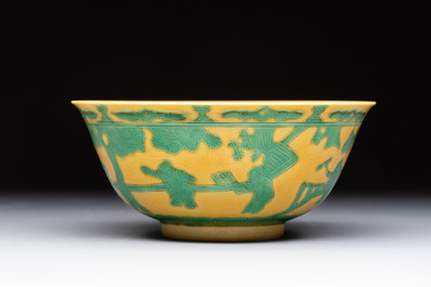 An imperial Chinese green-enamelled yellow-ground 'playing boys' bowl, Yongzheng mark and of the period