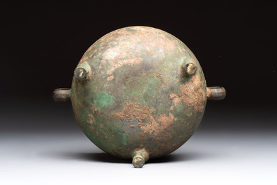 A Chinese archaic bronze tripod food vessel, 'dun 敦', Eastern Zhou