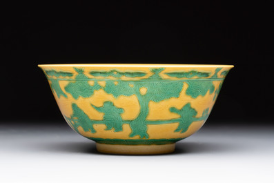 An imperial Chinese green-enamelled yellow-ground 'playing boys' bowl, Yongzheng mark and of the period