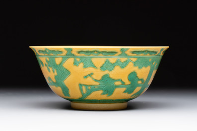 An imperial Chinese green-enamelled yellow-ground 'playing boys' bowl, Yongzheng mark and of the period