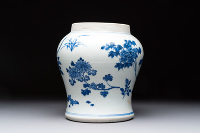 A Chinese blue and white vase with floral design, Transitional period