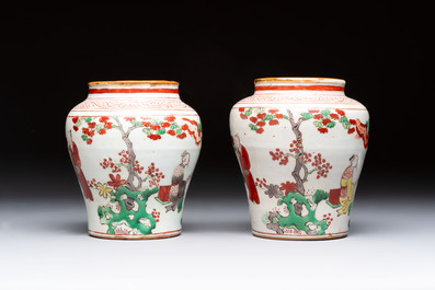 A pair of small Chinese wucai jars with sages in a landscape, Transitional period