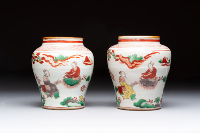 A pair of small Chinese wucai jars with sages in a landscape, Transitional period