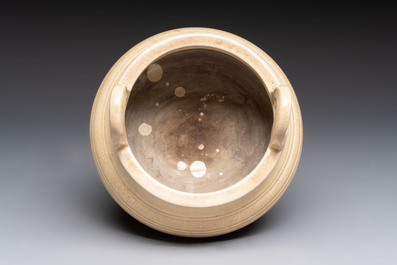 A Chinese Swatow cream-glazed tripod censer with wooden cover, 18/19th C.