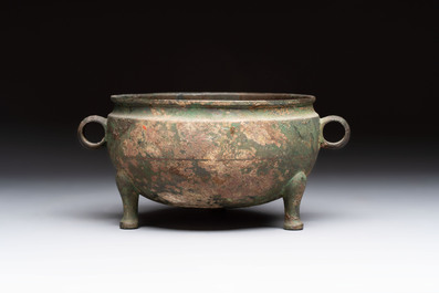 A Chinese archaic bronze tripod food vessel, 'dun 敦', Eastern Zhou