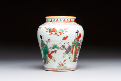 A small Chinese wucai jar with figures in a landscape, Transitional period