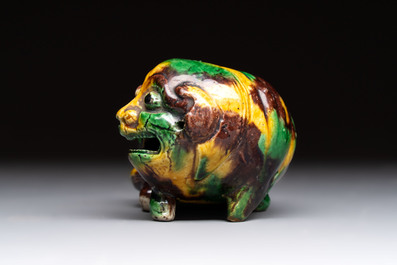 A Chinese sancai-glazed model of a dog, 19th C.