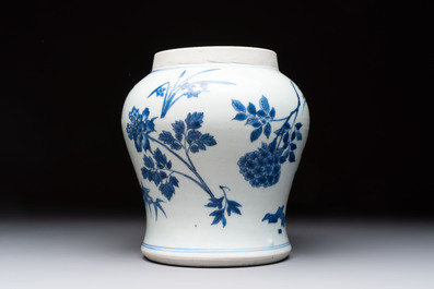 A Chinese blue and white vase with floral design, Transitional period