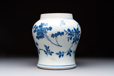 A Chinese blue and white vase with floral design, Transitional period