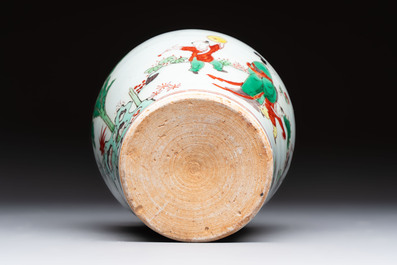 A small Chinese wucai jar with figures in a landscape, Transitional period