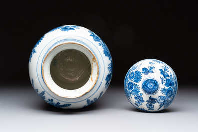 A blue and white Dutch Delft vase and cover with floral design, early 18th C.
