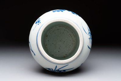 A Chinese blue and white vase with floral design, Transitional period