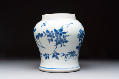 A Chinese blue and white vase with floral design, Transitional period