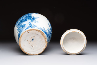 A blue and white Dutch Delft vase and cover with floral design, early 18th C.