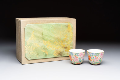 A pair of Chinese famille rose 'millefleurs' cups with a presentation box, Jiaqing mark, Republic