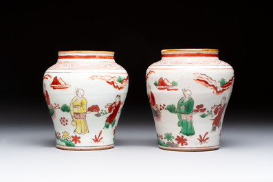 A pair of small Chinese wucai jars with sages in a landscape, Transitional period