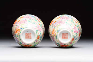 A pair of Chinese famille rose 'millefleurs' cups with a presentation box, Jiaqing mark, Republic