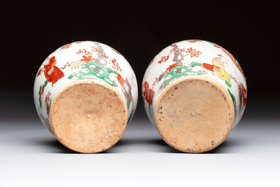 A pair of small Chinese wucai jars with sages in a landscape, Transitional period