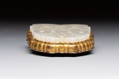 A Chinese gilt bronze-mounted white jade 'double happiness' belt buckle, 18th C.