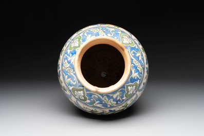 A Qajar polychrome pottery 'flower scroll' vase, Iran, 19th C.