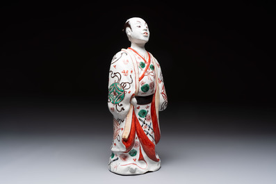 A Japanese Arita Imari figure of a samurai dressed in a kimono, Edo, 17/18th C.