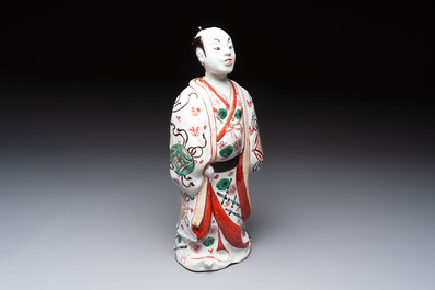 A Japanese Arita Imari figure of a samurai dressed in a kimono, Edo, 17/18th C.