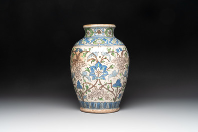 A Qajar polychrome pottery 'flower scroll' vase, Iran, 19th C.