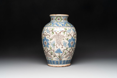 A Qajar polychrome pottery 'flower scroll' vase, Iran, 19th C.