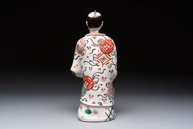 A Japanese Arita Imari figure of a samurai dressed in a kimono, Edo, 17/18th C.