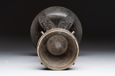 A fine Chinese archaistic bronze 'gu' vase, Ming