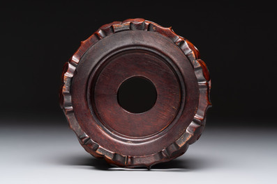 A large Chinese flamb&eacute;-glazed 'yuhuchunping' vase on a wooden stand, 19th C.